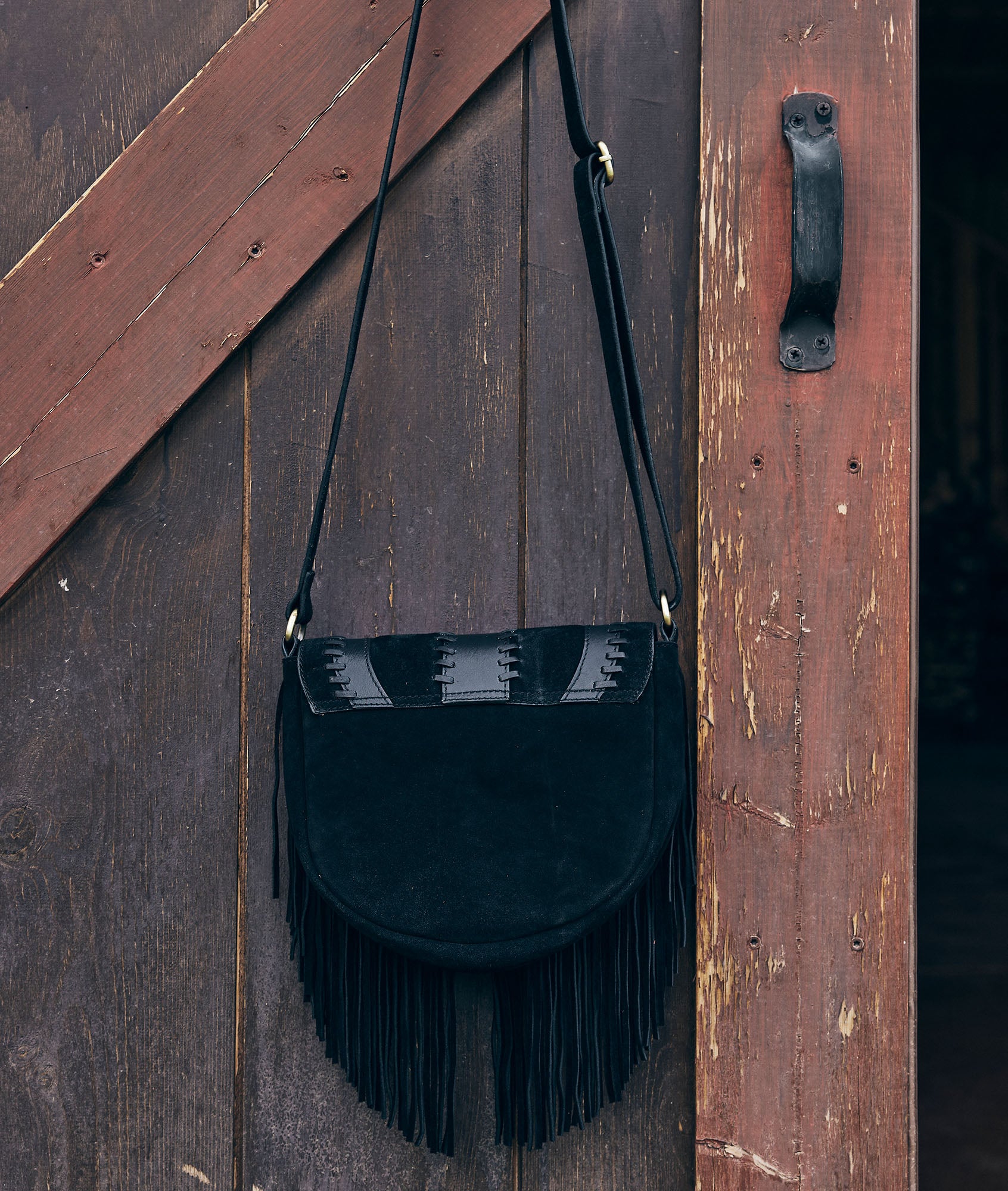 Sac besace en cuir frangé noir Leotie Faume - seconde main