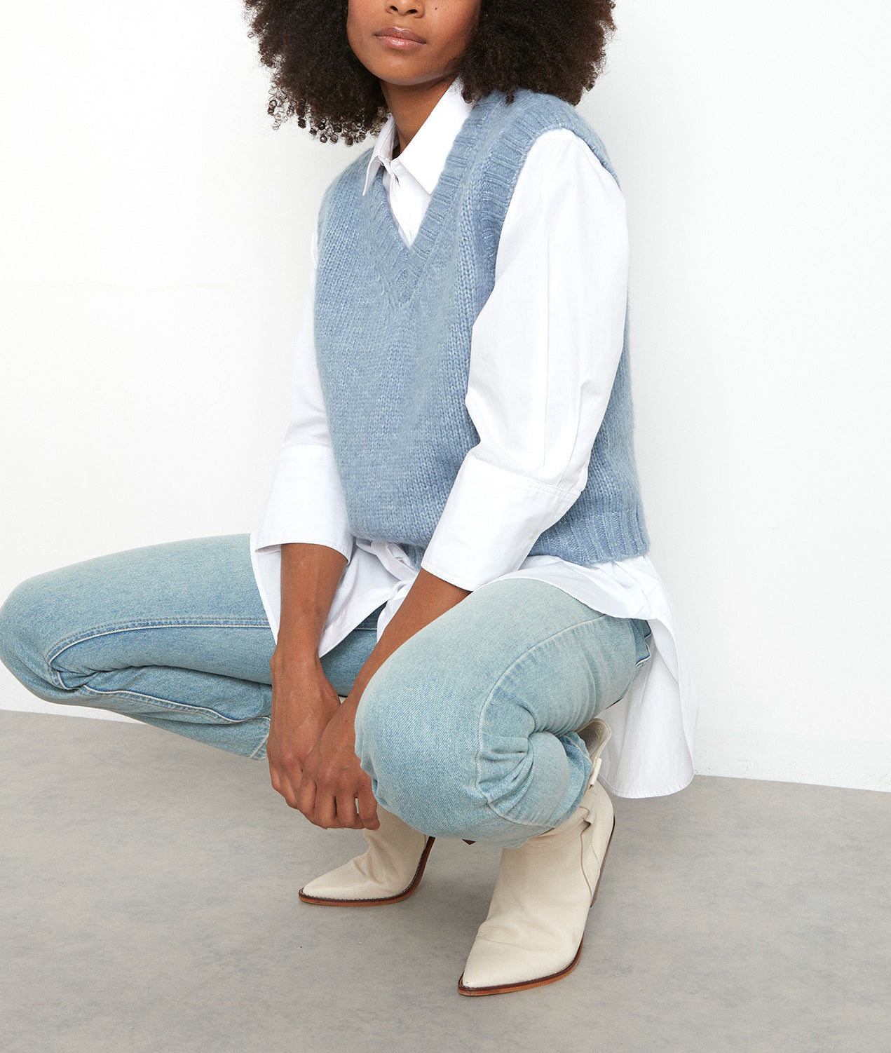 Pull sans manches col V bleu ciel Tolga Faume - seconde main