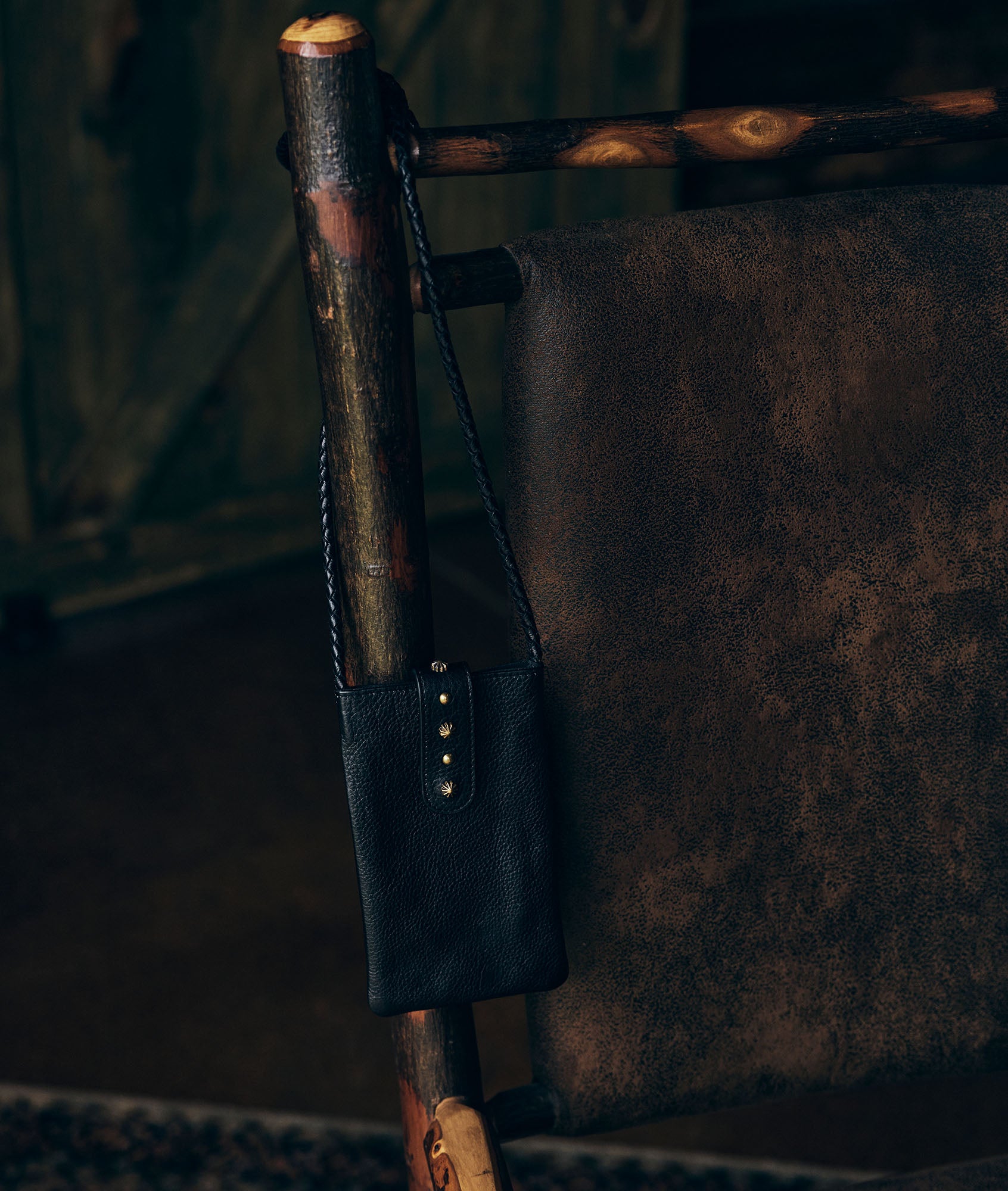 Pochette téléphone en cuir grainé noir Larry Faume - seconde main