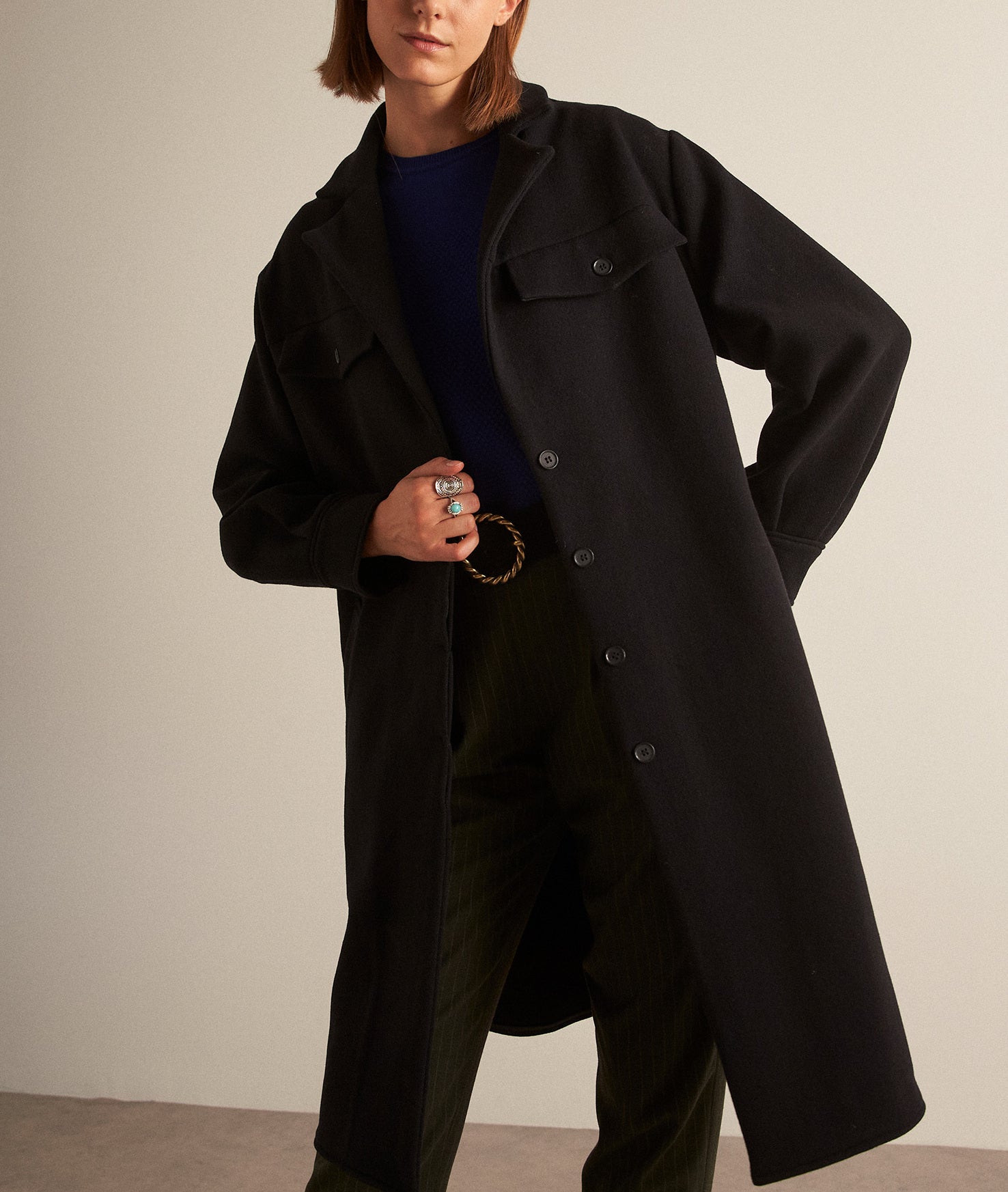 Manteau long noir en laine responsable Morgane Faume - seconde main