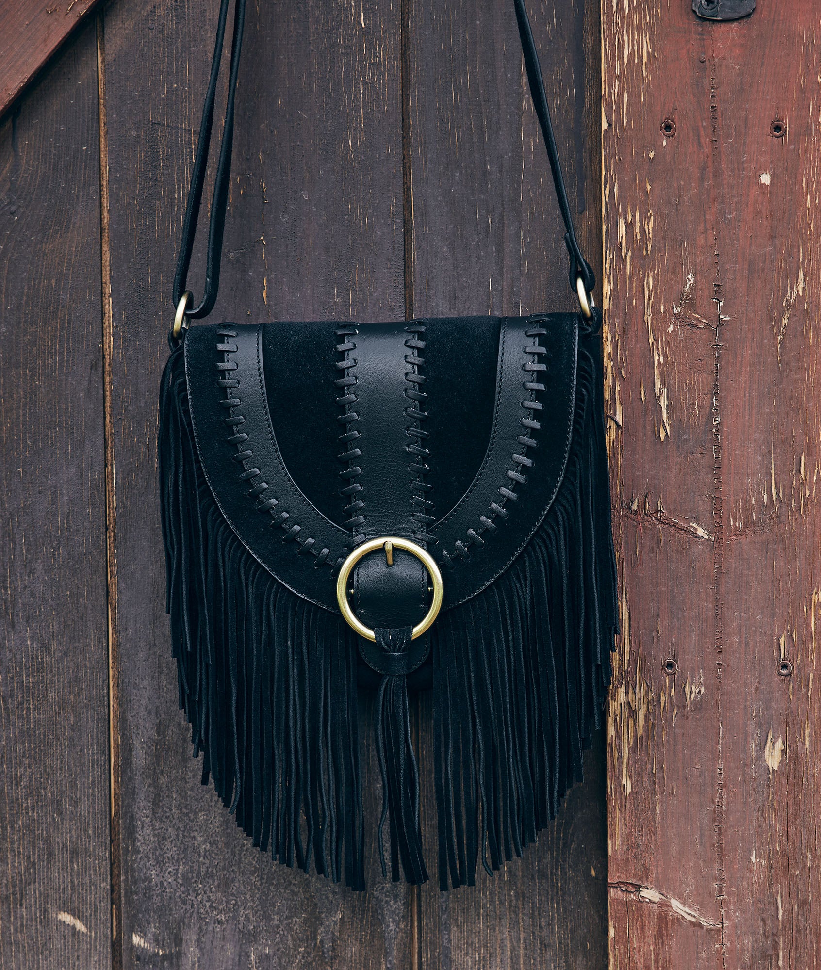 Sac besace en cuir frangé noir Leotie Faume - seconde main