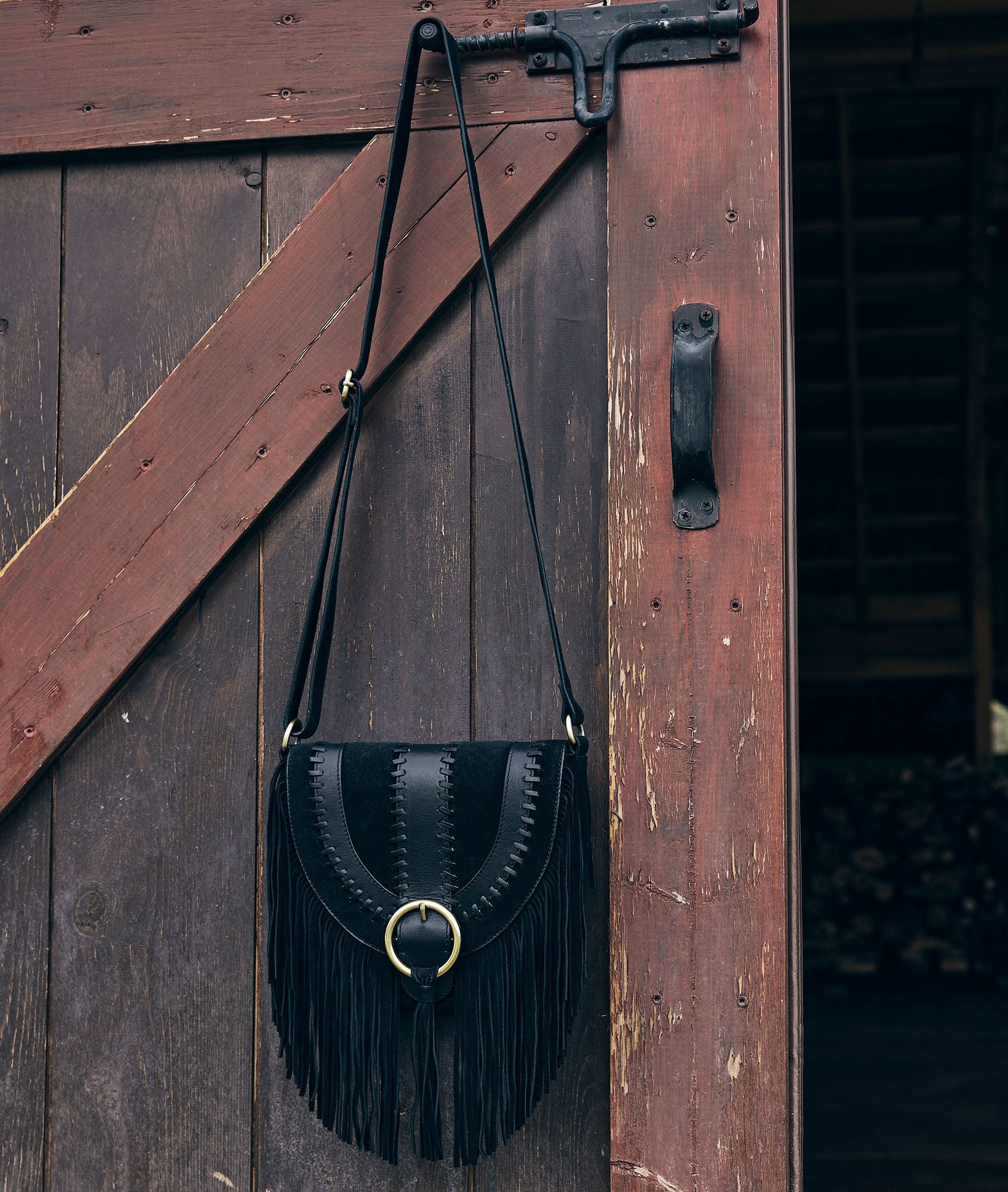 Sac besace en cuir frangé noir Leotie Faume - seconde main