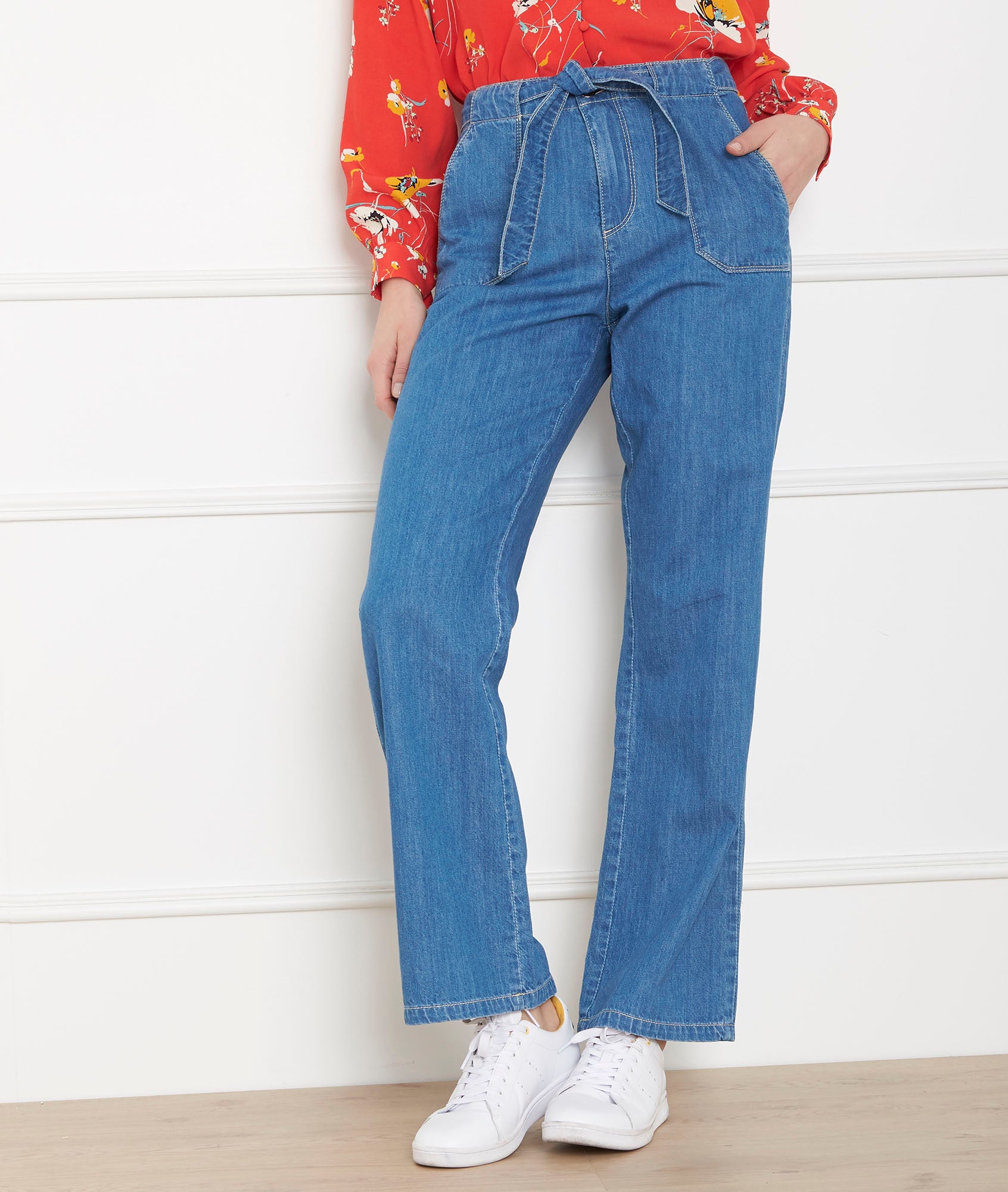 Jean flare indigo ceinturé Claudy Faume - seconde main