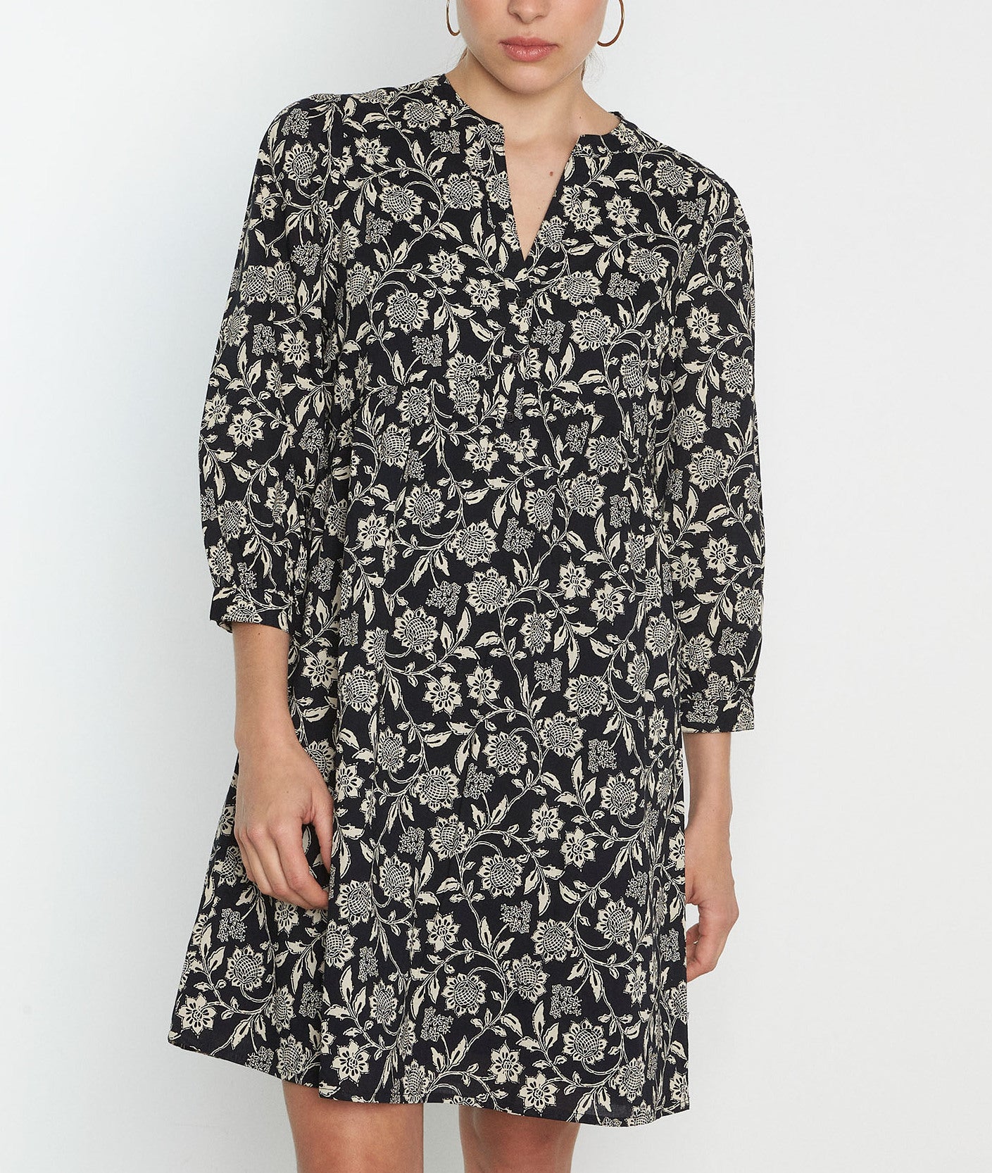 Robe courte en coton imprimé noir Calypso Faume - seconde main